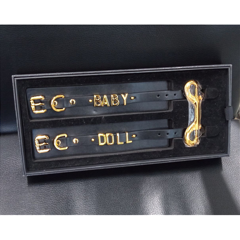 Наручники с надписью BABY DOLL от UPKO из итальянской кожи, черные с золотой фурнитурой