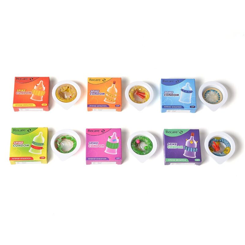 Насадка на член Recare Spike Condom Pink (презерватив с шариками и рядами шипов)