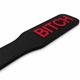 Паддл DS Fetish із червоним написом Bitch, чорний